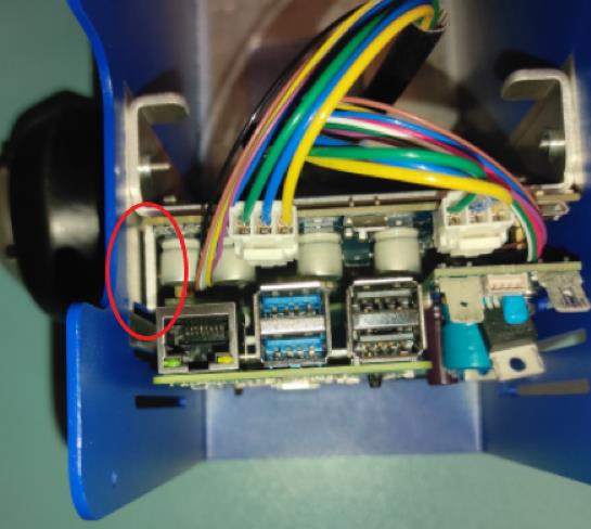 Screwing the RPI+HEATSINK on the chasis top view.