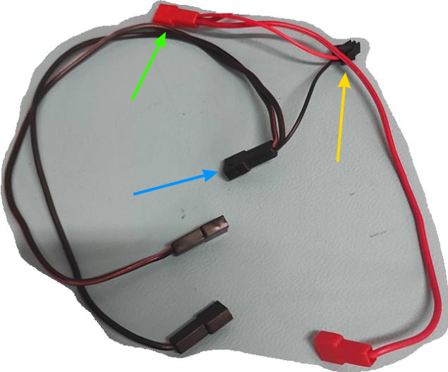 Wires with green and yellow circle.