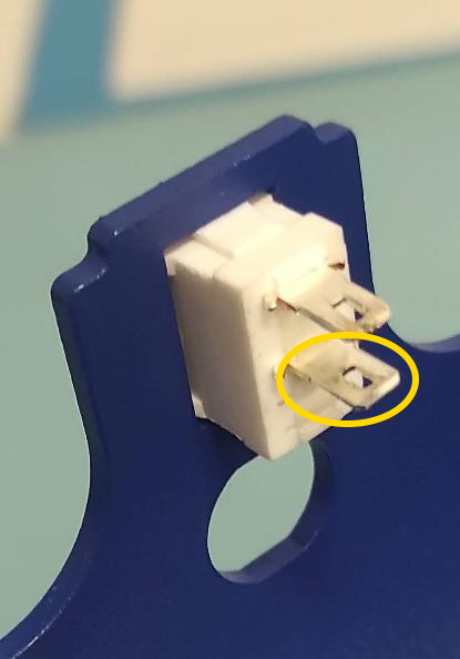 ON/OFF SWITCH with green circle for lower spade connector.